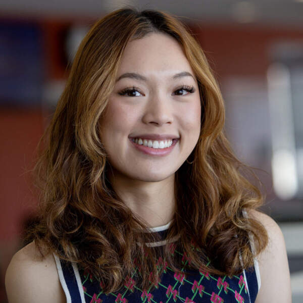 Sydney Ko smiling portrait.