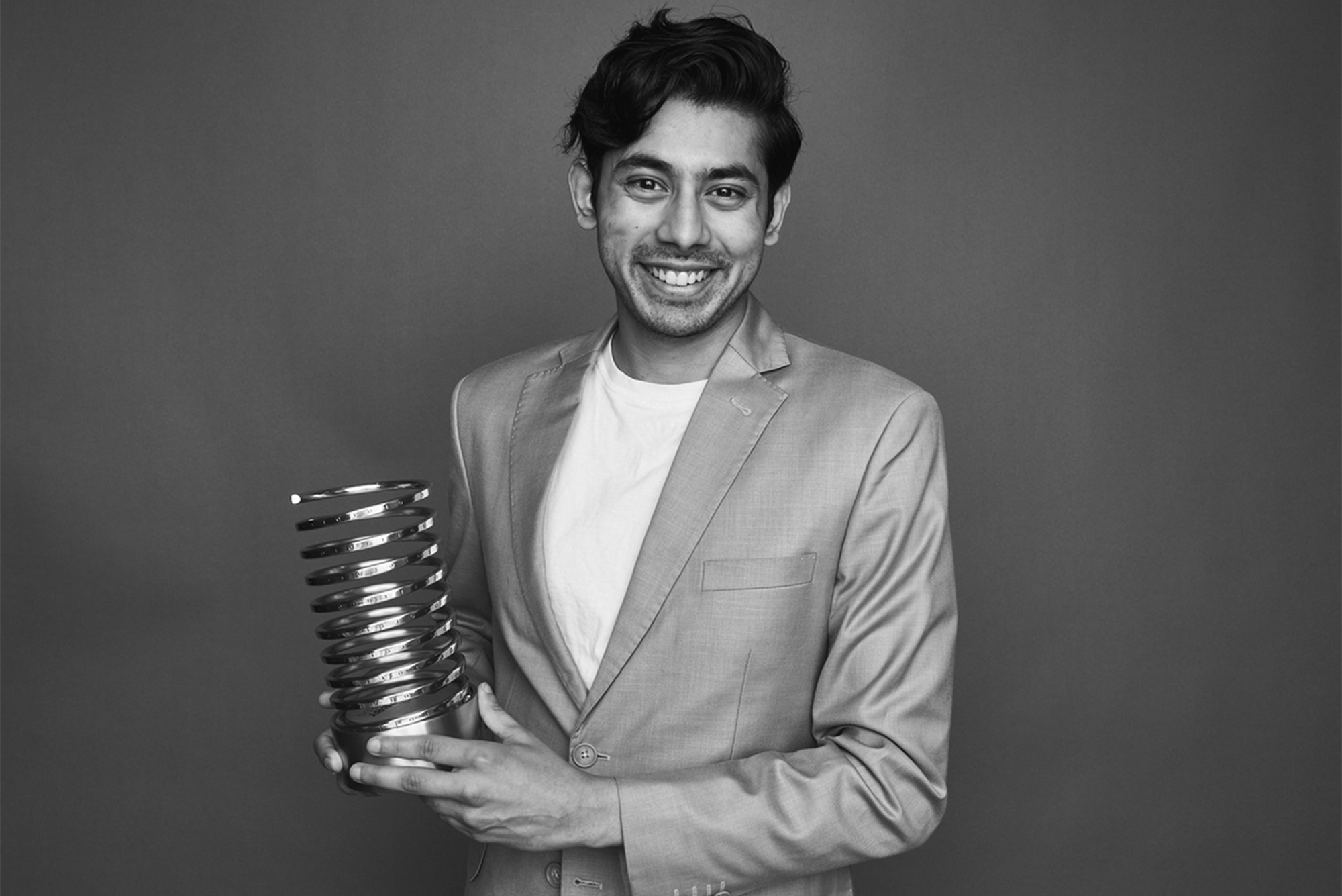 Rohan Gupta posing with Webby Award.